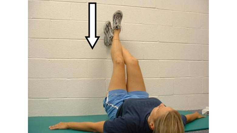 Wall knee flexion stretch